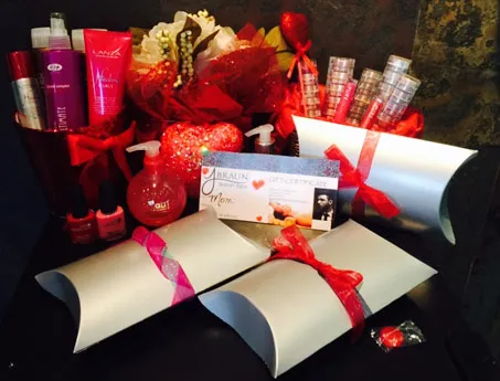 Salon gift packages wrapped with red ribbon